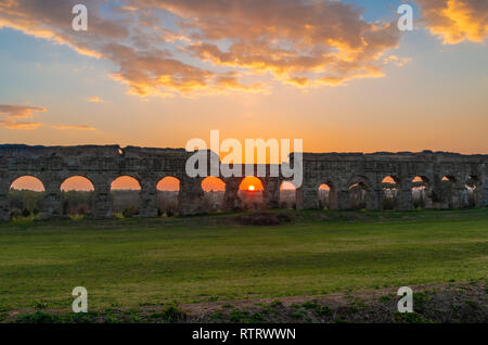 Rome (Italy) - The Parco degli Acquedotti at sunset, an archeological public park in Rome, part of the Appian Way Regional Park, with monumental ruins Stock Photo