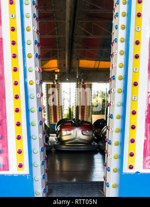 Amusement park bumper cars in a line. Stock Photo