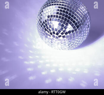 beautiful disco ball on yellow background isolated. Stock Photo