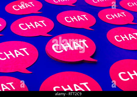 Chat,speech bubble icons on blue color background.Talking and  message for social media concepts ideas Stock Photo