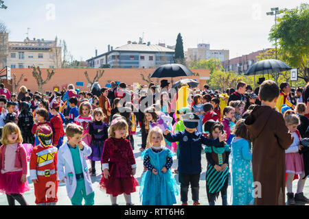 Murcia - Spain / March 1 / 2019: Primary school children disguised at Murcia, celebrating a carnival party dance in 2019. Stock Photo