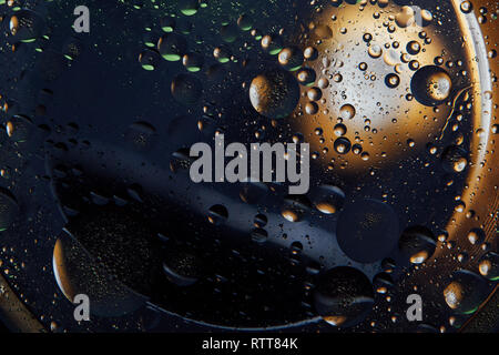 Beautiful abstract space background. Water drops of different colours Stock Photo