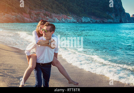 Beautiful passionate young couple having sex on the bed at home