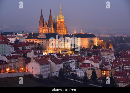 The Prague Castle and the St. Vitus Cathedral with night illumination. Winter evening. View from the Strahov Monastery. Stock Photo