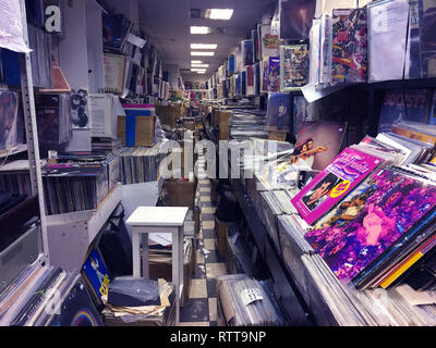 Retro styled image of boxes with vinyl turntable records on a flee market Stock Photo