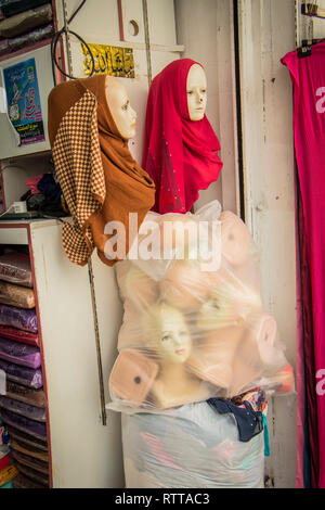 display of traditional hijab headscarves outside store in Little India, Kuala Lumpur Malaysia Stock Photo