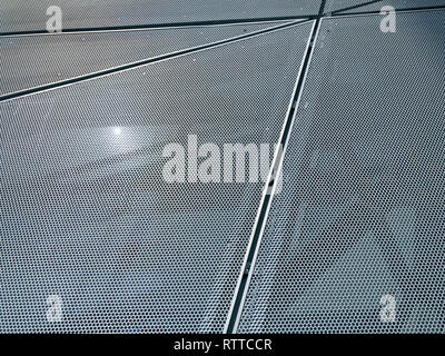 Seams Of Perforated Metal Panels On Facade Stock Photo