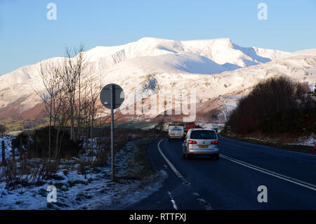 The Wainwright Blencathra (Saddleback) at Dawn in Winter from a Layby on the A66 in Lake District National Park, Cumbria, England, UK. Stock Photo