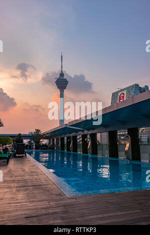 sunset view of KL tower from the rooftop swimming pool  of the Park Royal serviced suites In Kuala Lumpur, Malaysia Stock Photo