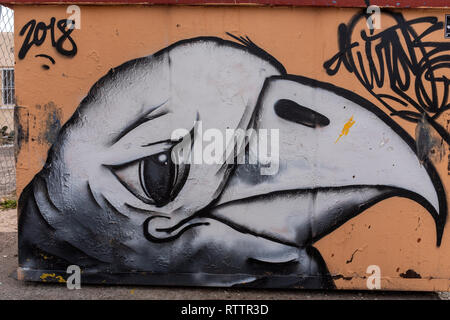 bird face painting on trash container (artist unidentifiable ) Stock Photo