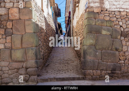 Inca walls in the streets of Cusco, stones carved for a perfect assembly Stock Photo