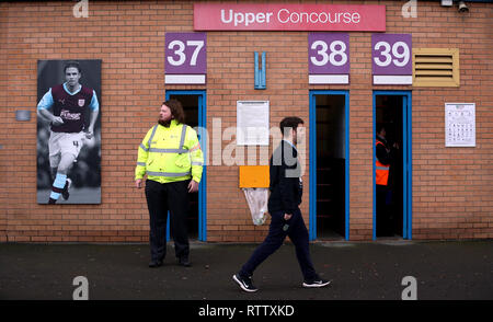 Fans arrive at the ground before the Premier League match at Turf Moor, Burnley.