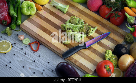 Slicing broccoli Stock Photo