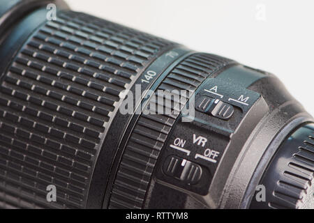 Lens autofocus and stabilizer on/off button, close up macro color photo, selective focus Stock Photo