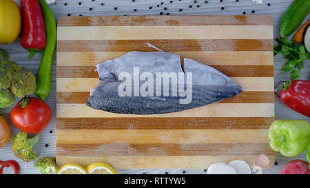 Bonito fish on the cutting board Stock Photo