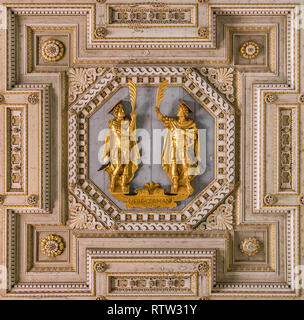 Detail from the ceiling of the Basilica of Saints John and Paul with the saints statues. Caelian Hill in Rome, Italy. Stock Photo