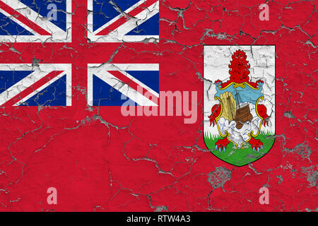 Flag of Bermuda painted on cracked dirty wall. National pattern on vintage style surface. Stock Photo