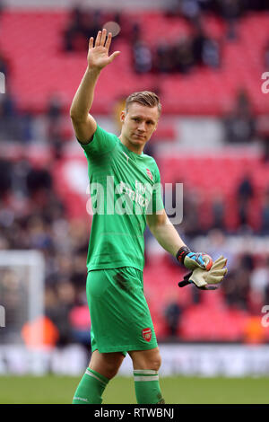 Wembley Stadium, London, UK. 2nd March 2019.   Bernd Leno of Arsenal thanks the Arsenal fan for the support during the Premier League match between Tottenham Hotspur and Arsenal at Wembley Stadium on March 2nd 2019 in London, England. Credit: PHC Images/Alamy Live News Credit: PHC Images/Alamy Live News Stock Photo
