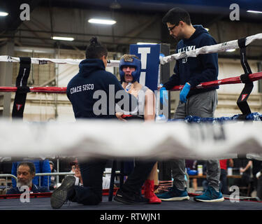 March 2, 2019: James Ferrari of Penn State (center) in between rounds in his fight against Emiliano Acorta of Wisconsin in the Amateur Boxing competition at the Arnold Sports Festival in Columbus, Ohio, USA. Brent Clark/Alamy Live News Stock Photo