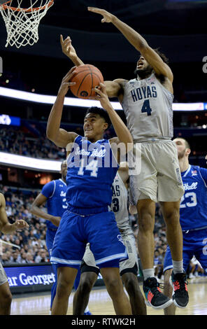 Washington, DC, USA. 2nd Mar, 2019. 20190302 - Seton Hall forward JARED RHODEN (14) hauls down a rebound under Georgetown guard JAGAN MOSELY (4) in the first half at Capital One Arena in Washington. Credit: Chuck Myers/ZUMA Wire/Alamy Live News Stock Photo