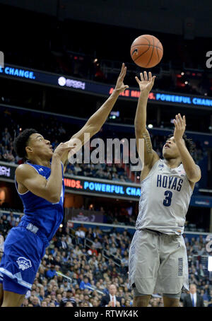 Washington, DC, USA. 2nd Mar, 2019. 20190302 - Georgetown guard JAMES AKINJO (3) scores over Seton Hall forward JARED RHODEN (14) in the second half at Capital One Arena in Washington. Credit: Chuck Myers/ZUMA Wire/Alamy Live News Stock Photo