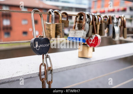 Lovelocks or love locks locked on to a bridge in Birmingham, England, GB, UK. Stock Photo