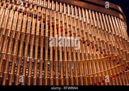 Shanghai, China - August 3, 2018: Golden Pipes, Decoration Waves of Modern Architecture. Shinning Bamboo Shaped. Stock Photo