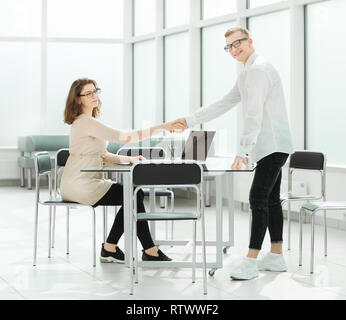 welcome handshake of business people at the meeting in the office Stock Photo
