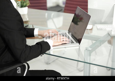 close up hands multitasking man using laptop connecting wifi Stock Photo