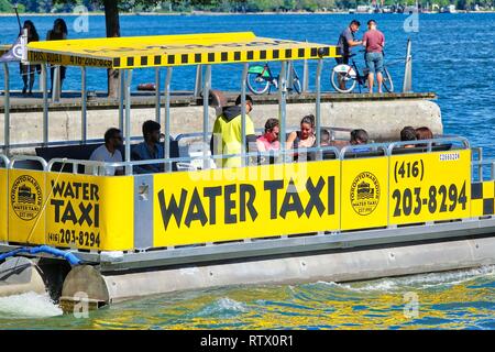 Toronto, Ontario, Canada-26 July, 2018: Water taxi connection to Toronto Islands from the downtown harbor Stock Photo