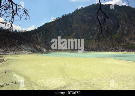 Kawah Putih is a natural sulfur rich volcanic lake in West Java, Indonesia. Stock Photo