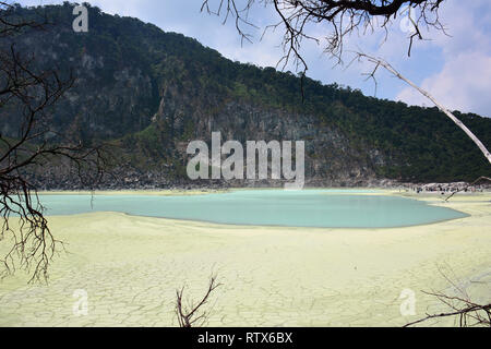 Kawah Putih is a natural sulfur rich volcanic lake in West Java, Indonesia. Stock Photo