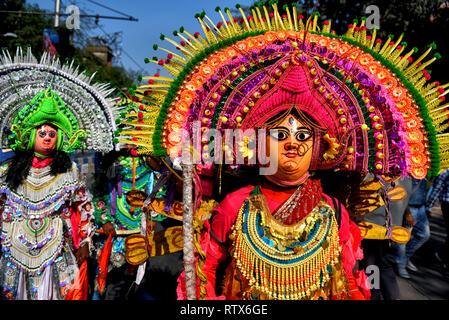 Chhau Artists of West Bengal seen dressed up as Lord Shiva during the procession. Devotees of Bharat Sevashram Sangha organized a religious procession to mark the Maha Shivaratri Festival which takes place on the 4th of March, in the streets of Kolkata, India. Stock Photo