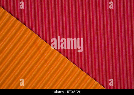Red and orange corrugated paper texture, use for background. vivid colour with copy space for add text or object. Stock Photo