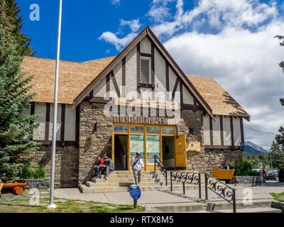 Banff Visitor Centre in the Town of Banff on June 19, 2015 in Banff National Park, Alberta. Banff is a resort town and one of Canada's most popular to Stock Photo