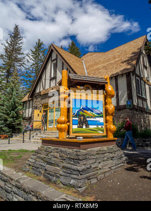 Banff Visitor Centre in the Town of Banff on June 19, 2015 in Banff National Park, Alberta. Banff is a resort town and one of Canada's most popular to Stock Photo