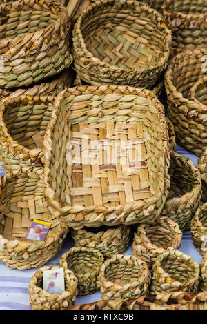 Totora crafts such as baskets, fans, animals and mats, handmade by artisans from Imbabura, Ecuador Stock Photo