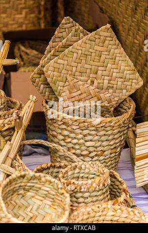 Totora crafts such as baskets, fans, animals and mats, handmade by artisans from Imbabura, Ecuador Stock Photo