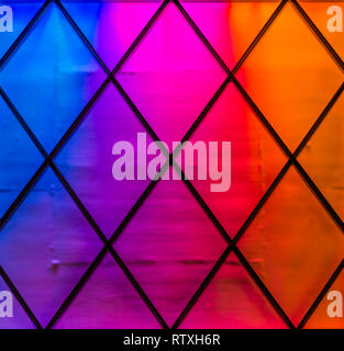 Modern and colorful lights in the colors blue,purple, pink, red and orange. Diamond pattern, Neon light background Stock Photo