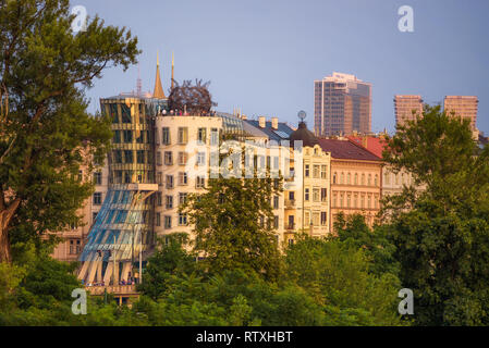 Dancing House in Prague seen from a nearby park Stock Photo