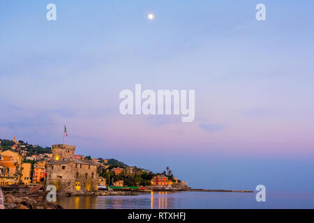 panorama italian sea village space text and moon high in the sky - Rapallo italy sea town copy space background night sunset Stock Photo