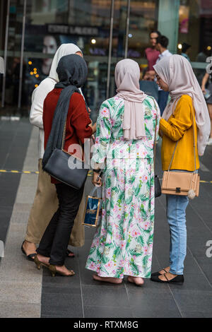 Malay or Malaysian Muslim Women Wearing Head Scarves and Islamic Dress ...