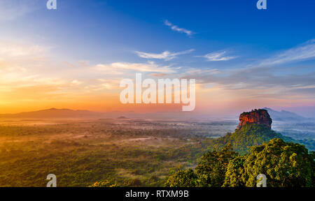 Sunrise view to Sigiriya rock from Pidurangala rock in Sri Lanka Stock Photo