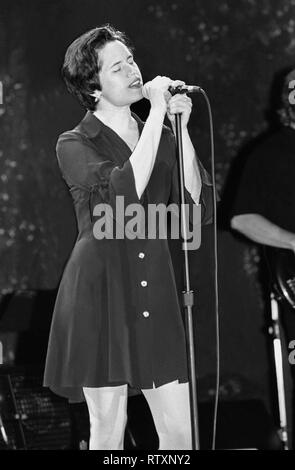 Singer Natalie Merchant is shown performing on stage during a 