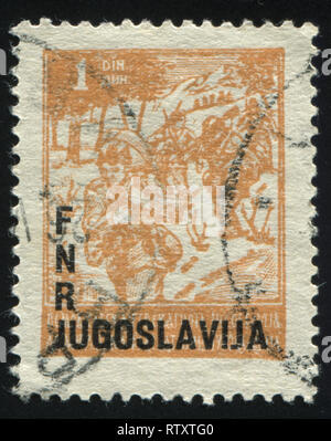 RUSSIA KALININGRAD, 12 NOVEMBER 2016: stamp printed by Yugoslavia, shows partisans, circa 1945 Stock Photo