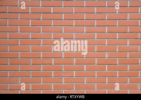 Red brown block brick wall Beautifully arranged texture background. Stock Photo
