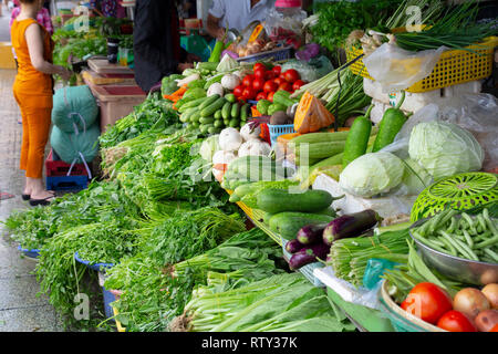 stall with fresh green vegetables on farmers market