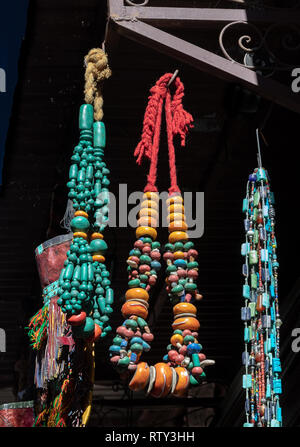 Necklaces of beads on sale in the medina, Marrakesh, Morocco Stock Photo