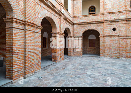 Quito, Ecuador, January 2019: Interiors of the Contemporary Art Center, exposed brick walls and arches, where works of contemporary artists are exhibi Stock Photo