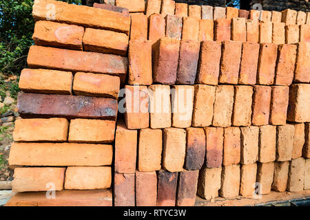 Handmade bricks, stacked for sale Stock Photo